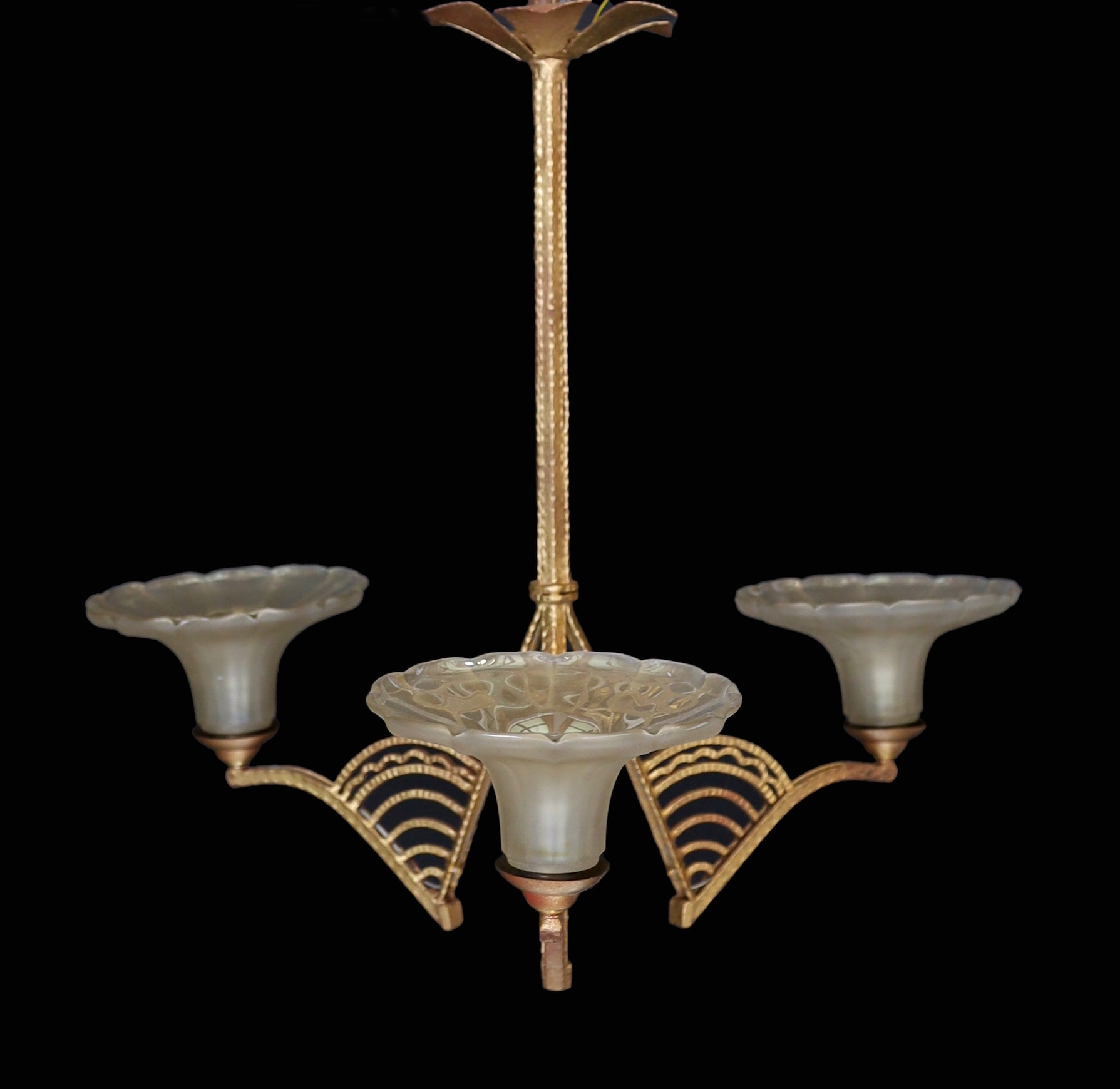 A 1920s French gold painted wrought iron light fitting with iridescent glass shades, height 62cm. width 68cm